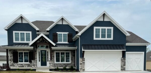 Jefferson expanded 1.5-story floor plan with traditional B elevation by Patriot Homes